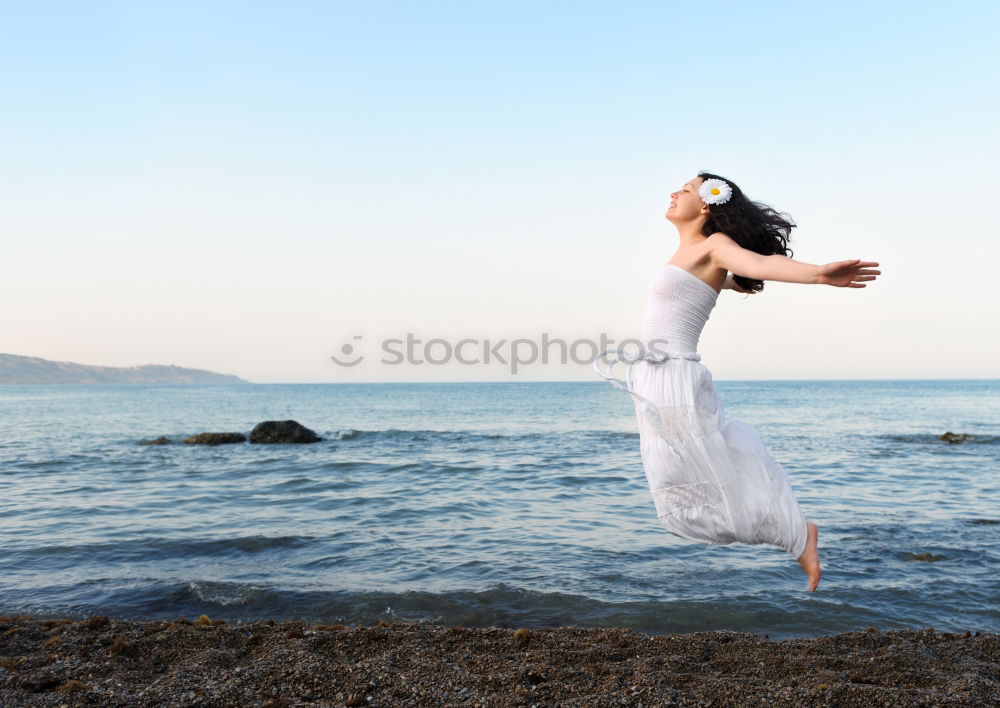 Similar – Little girl feeling free on the beach