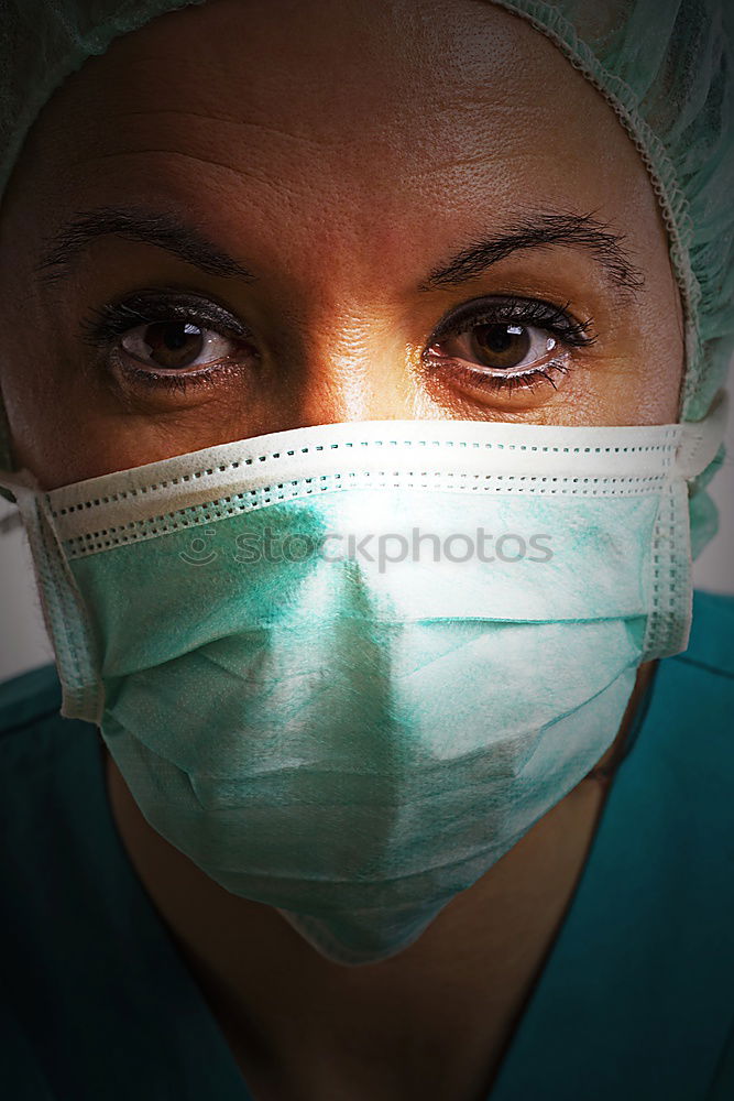 Similar – Foto Bild Konzentrierte Chirurgin bei der Arbeit
