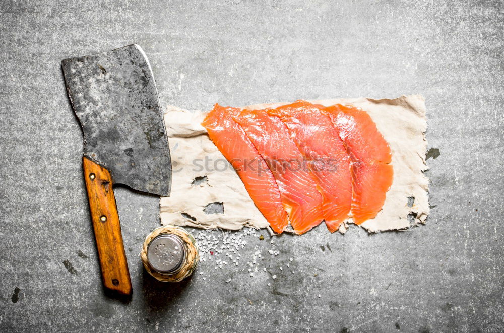 Similar – Fresh raw salmon on a wooden cutting board