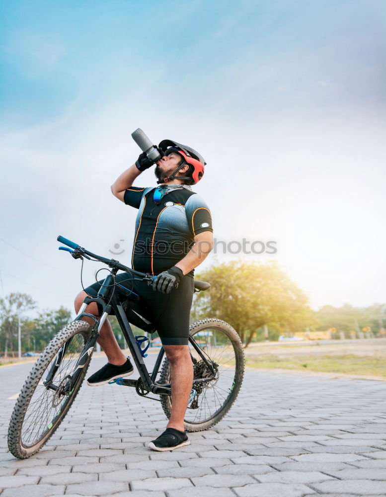 Similar – Image, Stock Photo Naughty boy with defiant gesture over bike on a cycleway