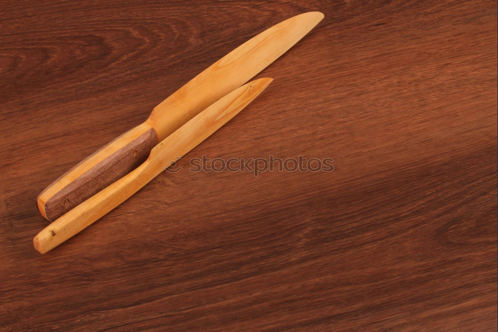 Similar – rolling pin on black wood as background