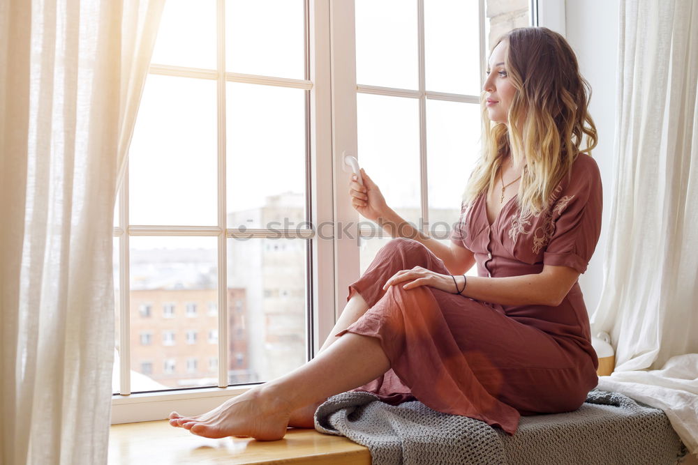 Similar – Image, Stock Photo young woman sitting on her diy couch with phone