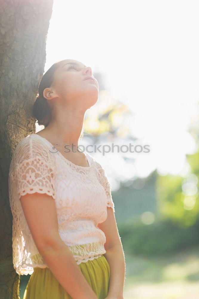 Image, Stock Photo Cheerful woman smiling in garden