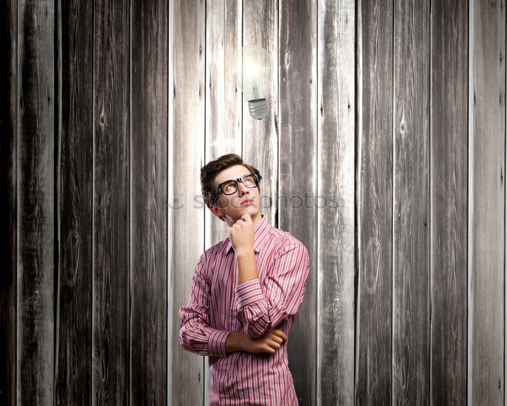 Similar – Image, Stock Photo young man with duffle coat waits in the house entrance