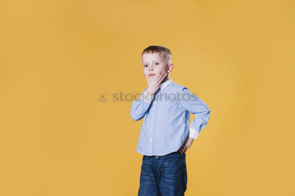 Similar – Cheerful child standing with his backpack on the floor