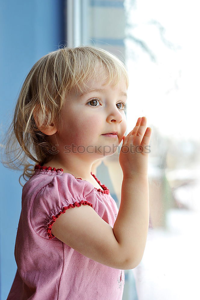 Similar – Image, Stock Photo Child’s face in the pose of a thinker