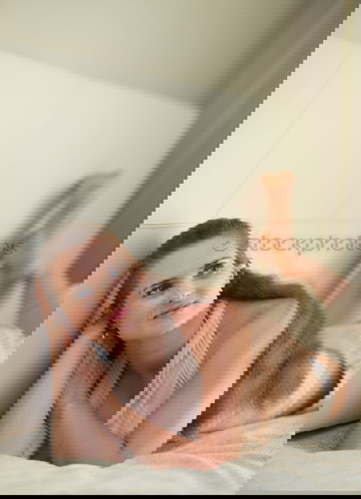Similar – Image, Stock Photo Young, slim, athletic woman in underwear sits sideways on an armchair and looks into the camera
