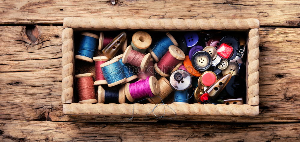 Similar – Thread spools and buttons