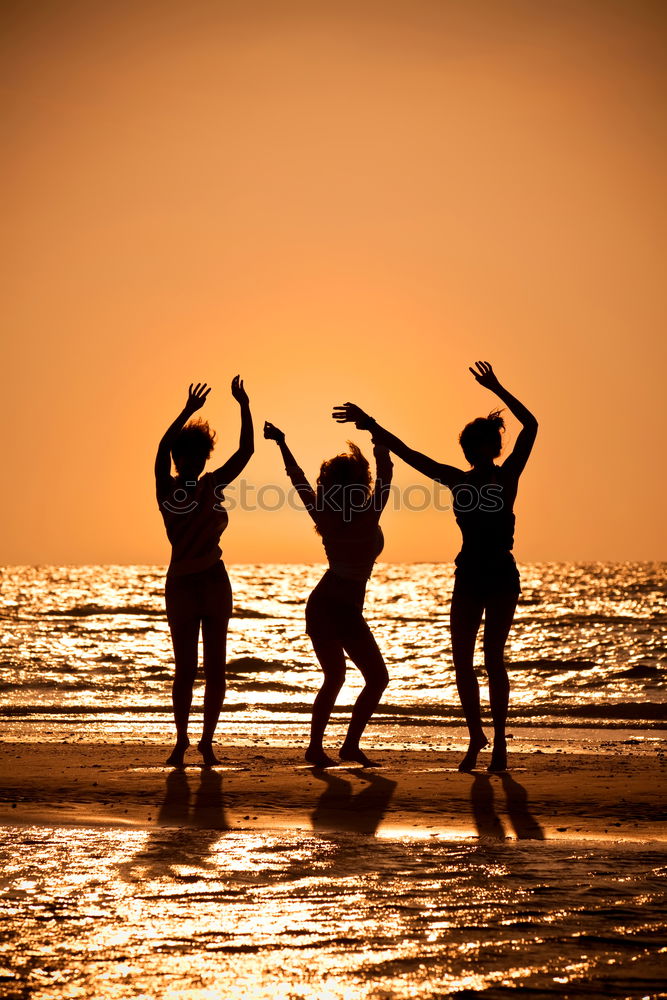 Similar – Happy children playing on the beach at the sunset time. Three Kids having fun outdoors. Concept of summer vacation and friendly family.