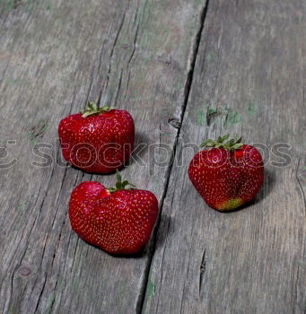 Similar – Bunch of red wild strawberry