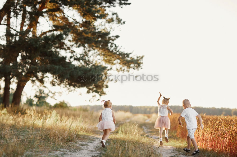 Image, Stock Photo Grandfather showing his hat to grandchild outdoors