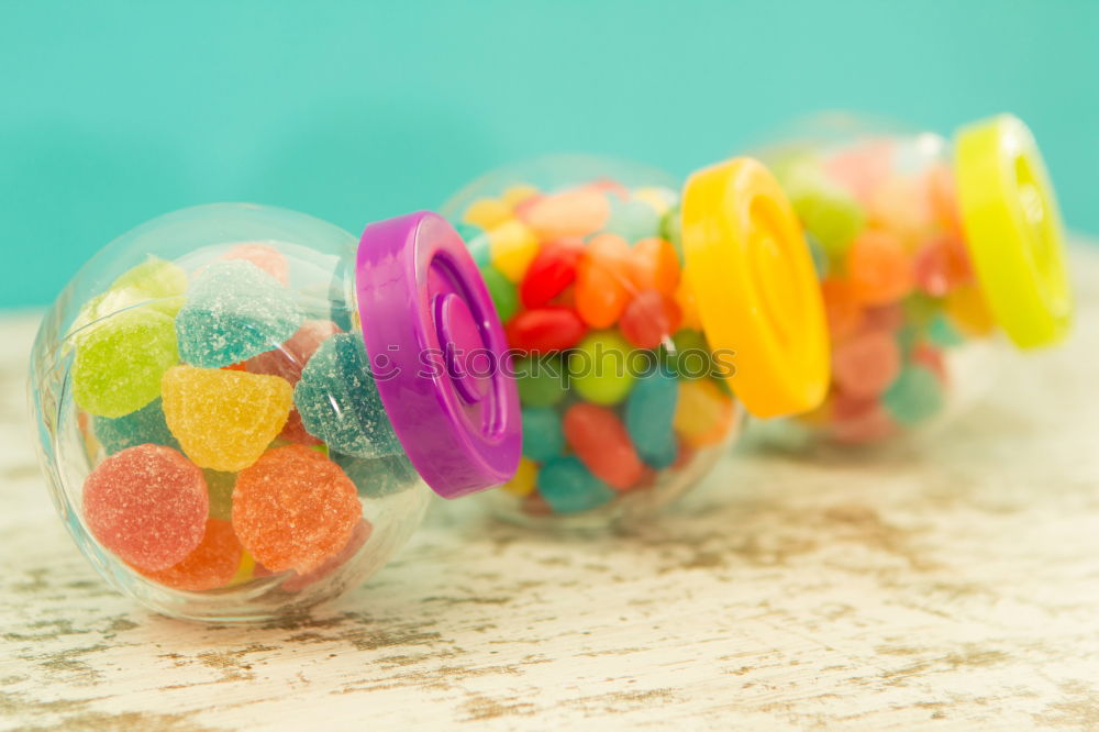 Similar – Image, Stock Photo Colorful jelly beans of different sizes close to wallpaper