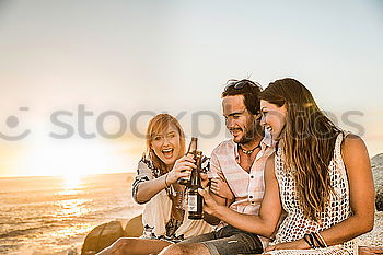 Similar – Image, Stock Photo Happy young adult couple with cute puppy