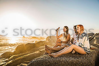 Similar – Image, Stock Photo Pretty women sitting on roof