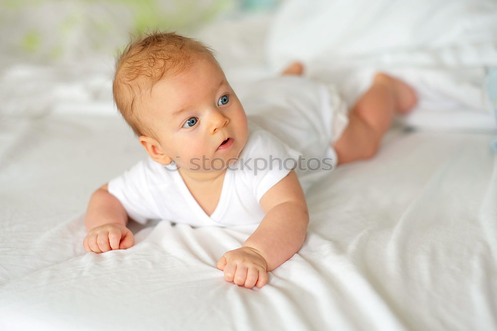 Similar – Cute Baby Girl Lying in the Crib