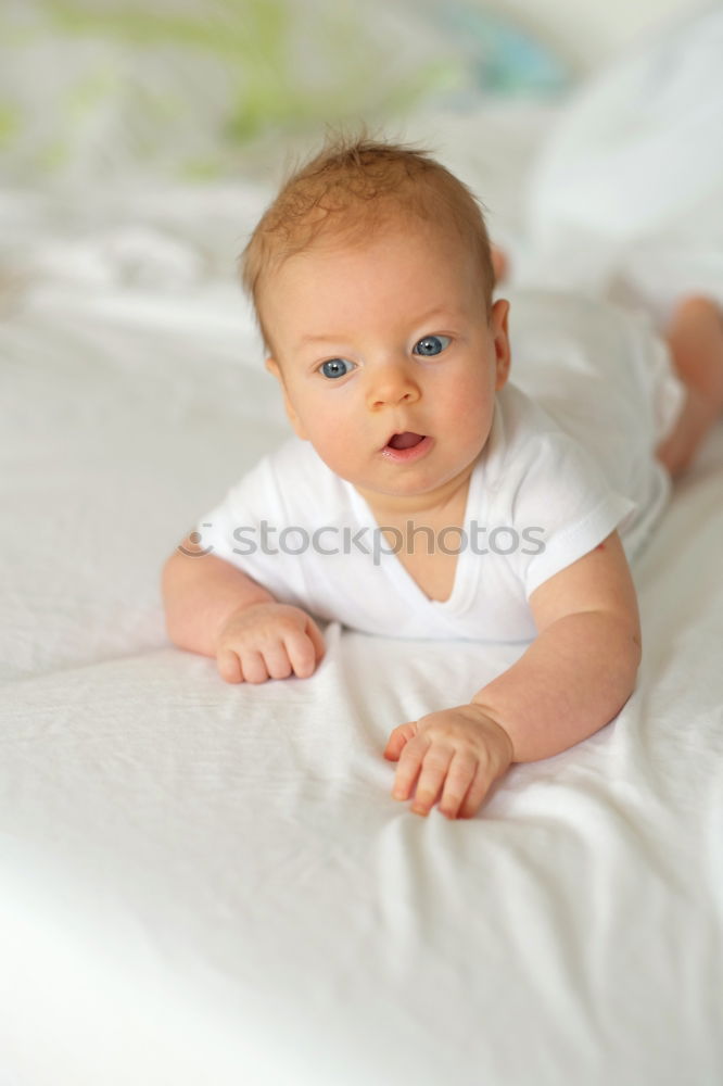 Similar – Cute Baby Girl Lying in the Crib