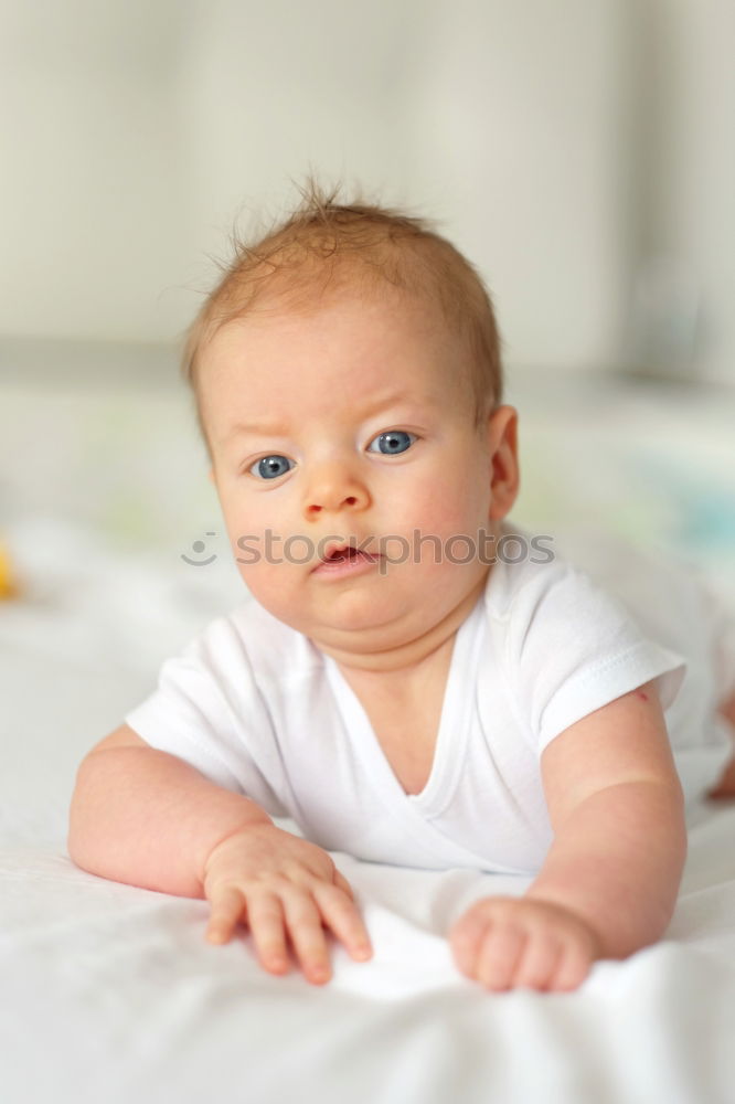 Similar – Cute Baby Girl Lying in the Crib