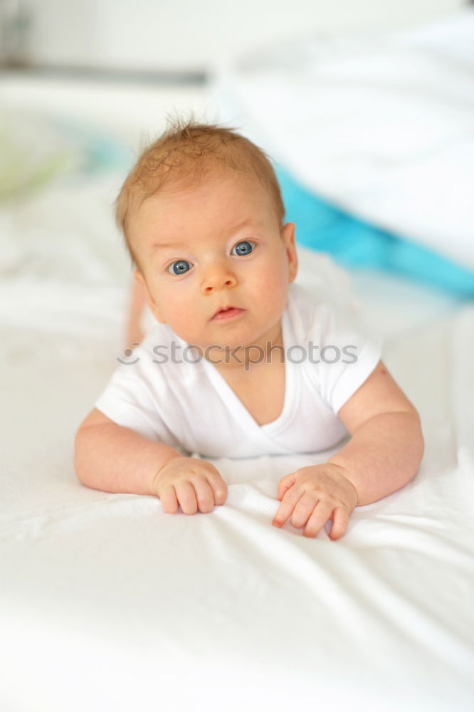 Cute Baby Girl Lying in the Crib