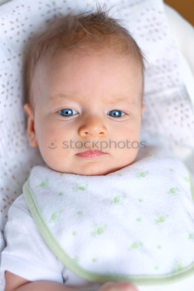 Similar – Image, Stock Photo Lovely newborn baby girl with a warm pajama at home