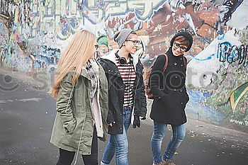 Similar – Image, Stock Photo Group of friends in the street with smartphone