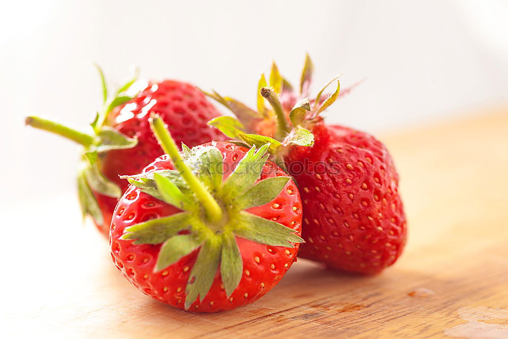 Similar – Strawberries on a wooden board with empty space