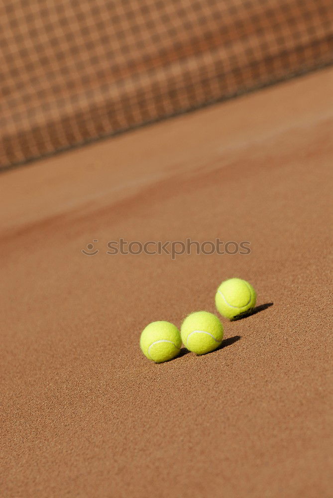 Similar – Image, Stock Photo Yellow tennis ball on red clay ground court