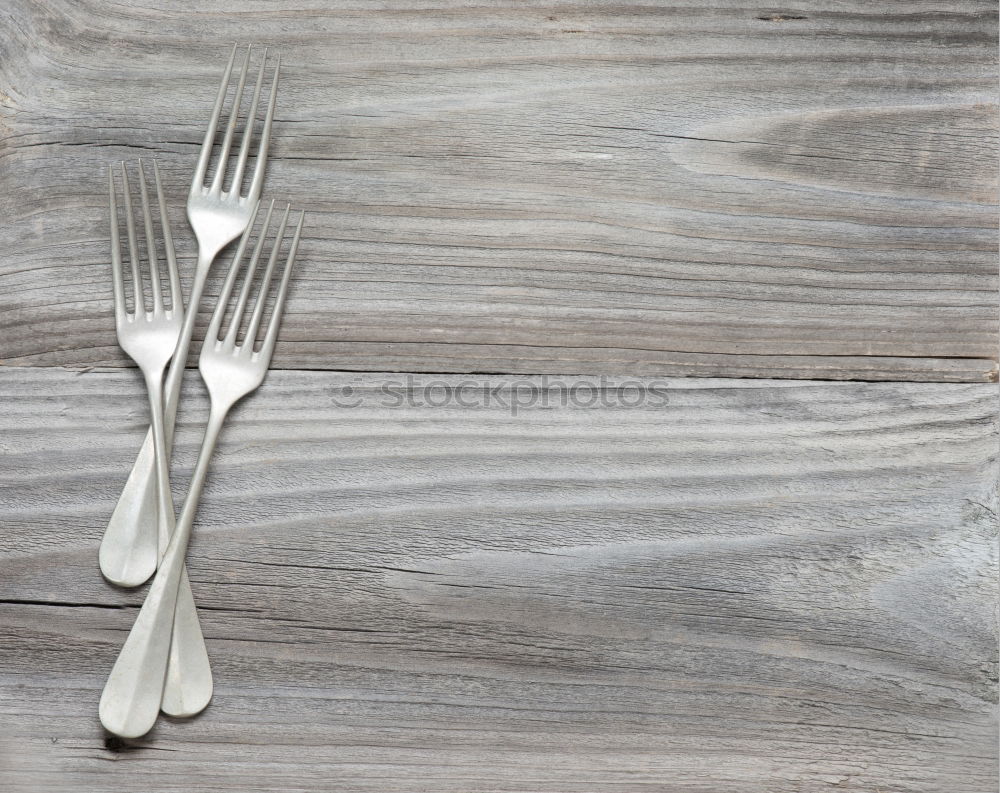 Similar – Image, Stock Photo Vintage fork and knife on a napkin