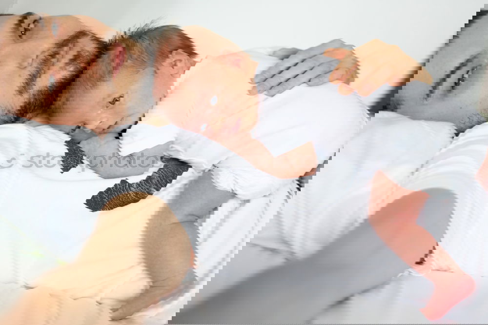 Similar – Image, Stock Photo Man kissing to peaceful newborn lying over bed