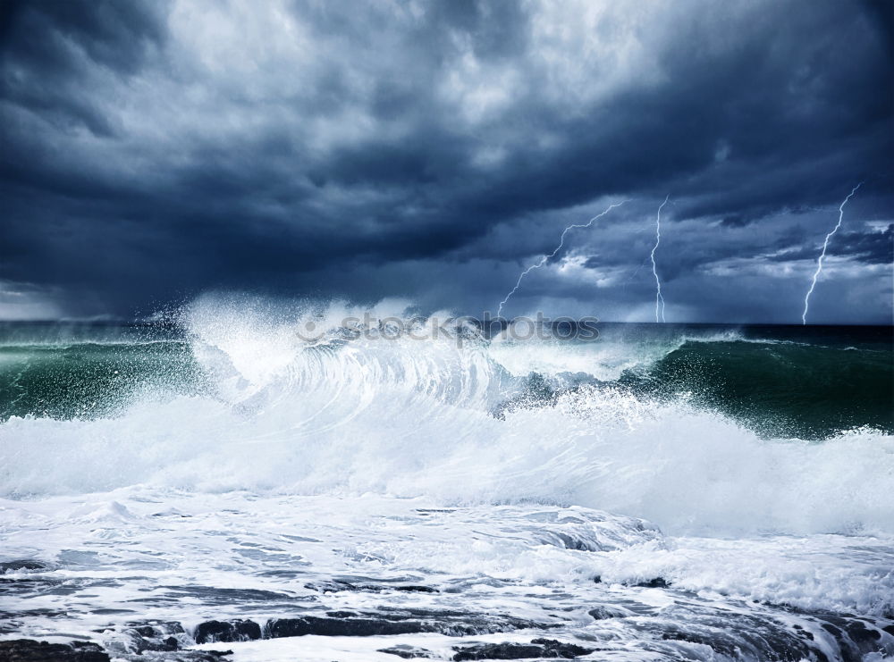 Similar – Rough sea waves in storm