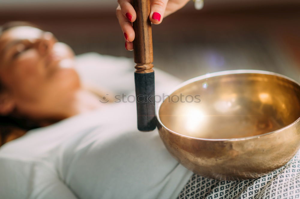Similar – Image, Stock Photo Hand playing yoga bowls outdoors.