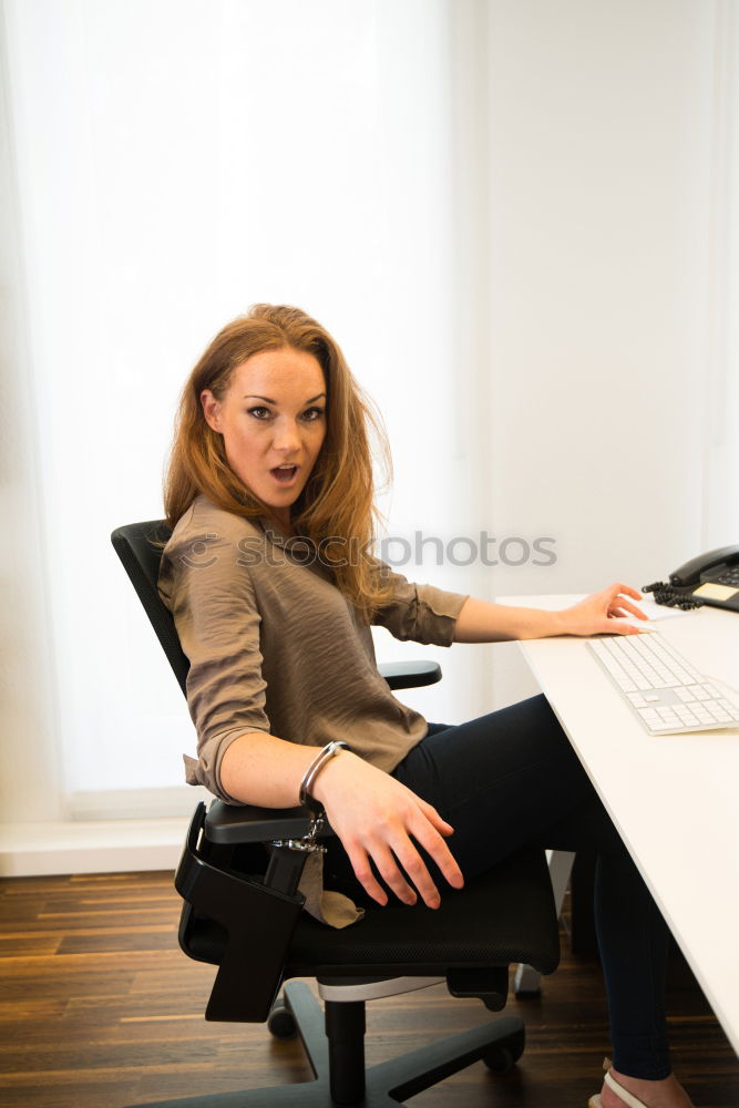 Similar – Image, Stock Photo Smiling woman sitting on a sofa at home using a laptop