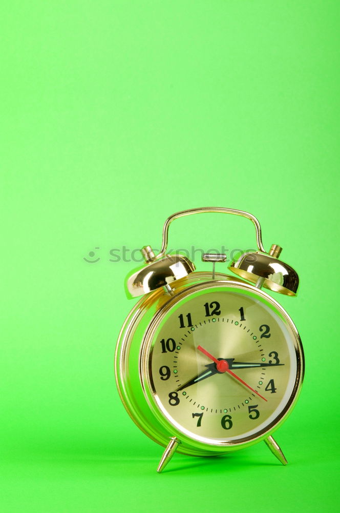 Image, Stock Photo Close up one alarm clock over green background