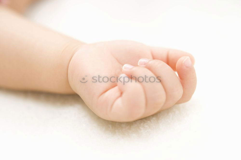 Similar – Hand of a small baby