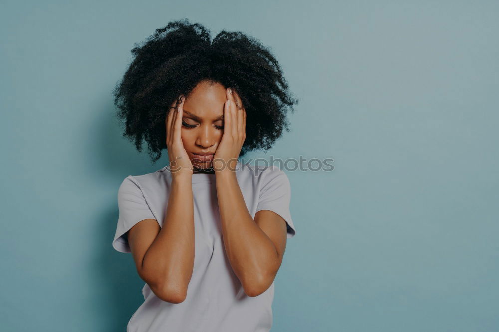 Similar – Portrait of beautiful afro woman covering her face.