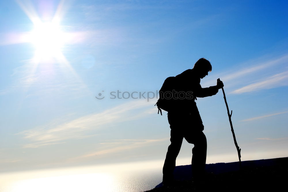 Similar – Male hiker standing on the top of a mountain.