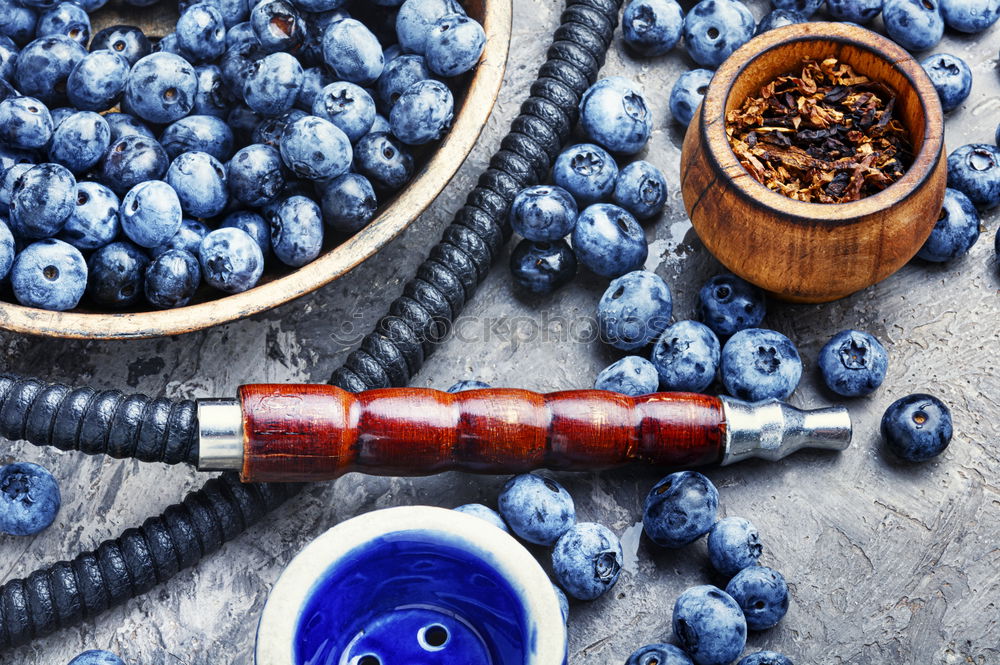 Similar – Stylish oriental shisha with blackberry