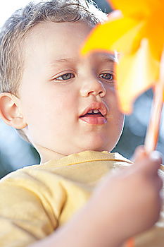 Similar – toddler plays in the garden