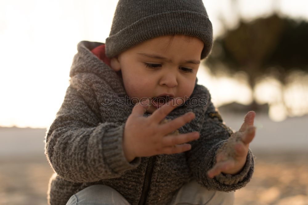 Similar – Image, Stock Photo child playing with sand