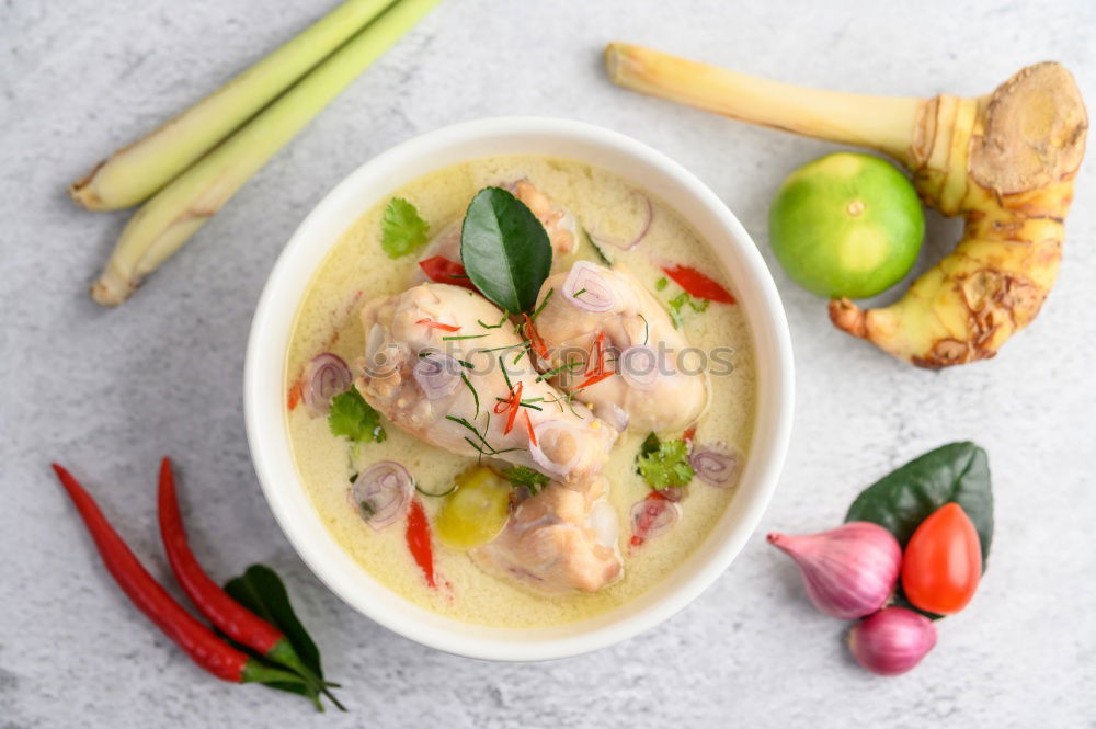 Similar – Image, Stock Photo Coconut peas soup with prawns