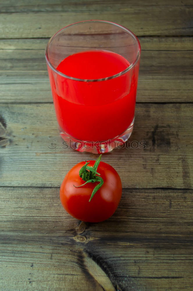 Similar – Juice from carrots, onions and spices in a glass jar