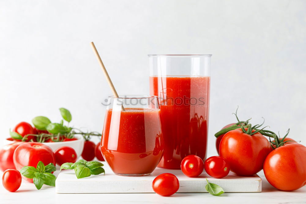 Similar – Fresh tomato soup with ingredients