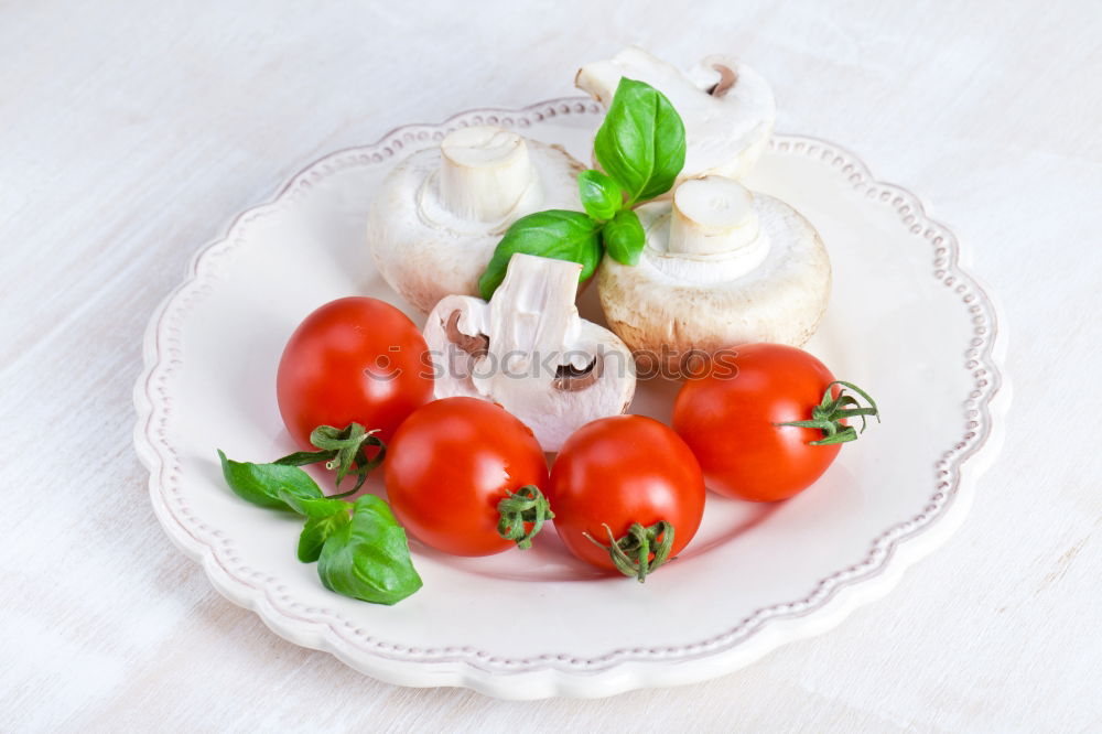 Similar – Fresh tomatoes in a green plate