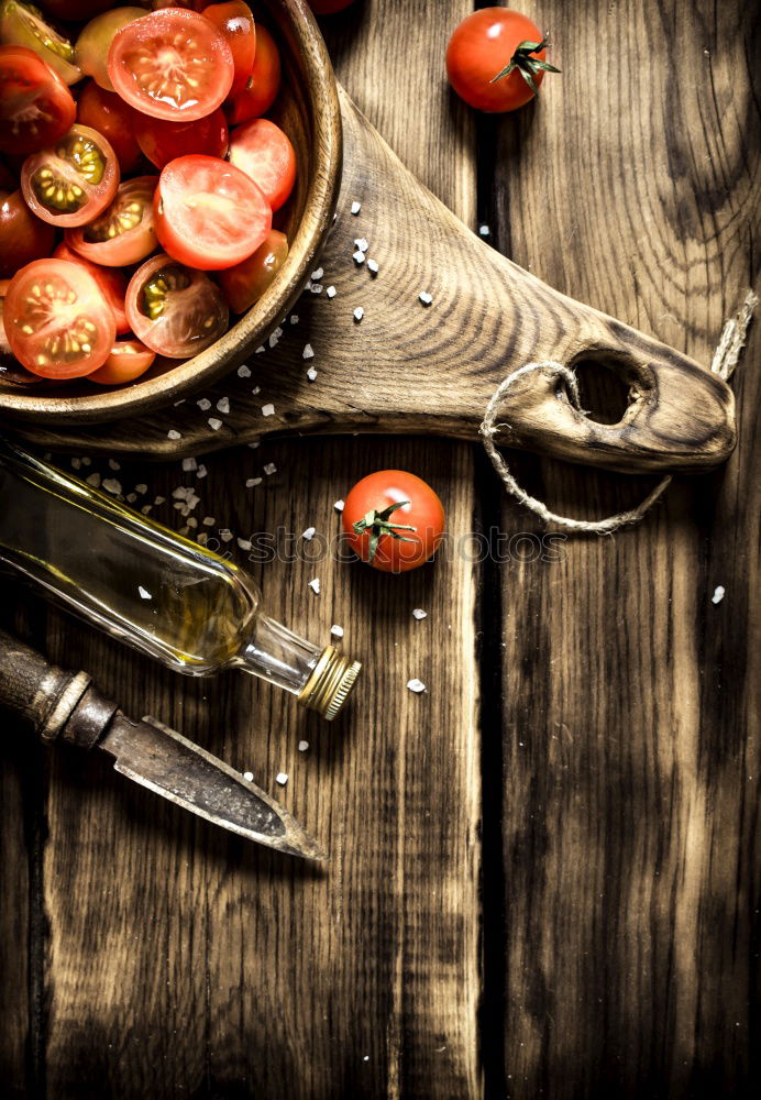 Similar – knife meets tomato