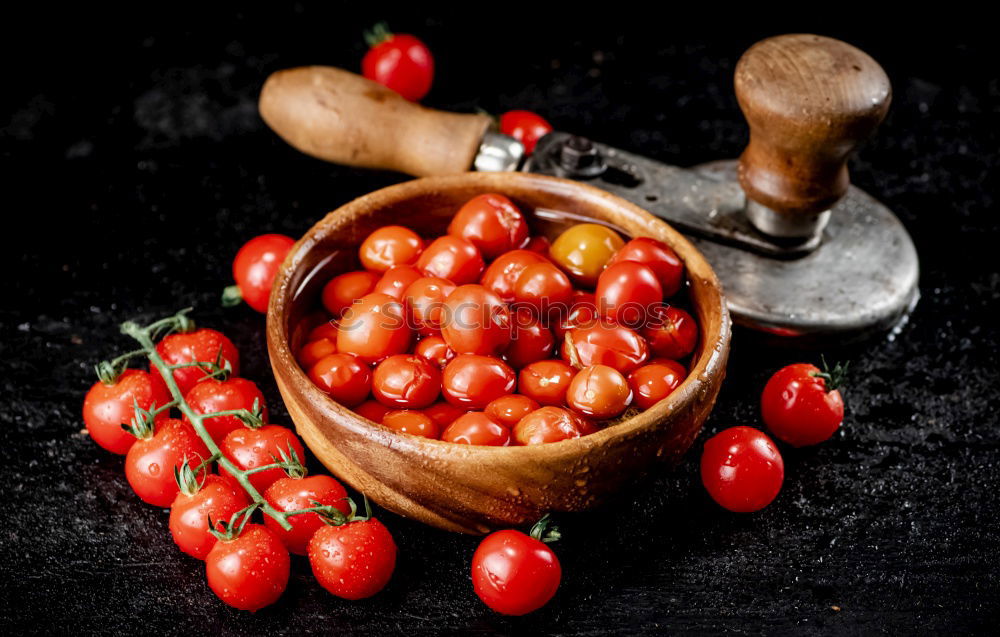 Similar – Image, Stock Photo cast iron round frying pan and ripe red cherry tomatoes