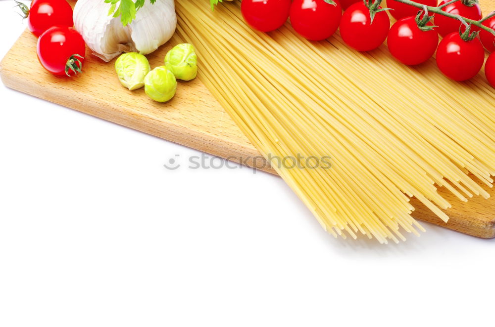 Similar – pasta spaghetti on black background