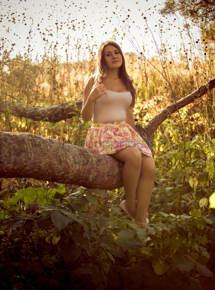 Similar – Summer portrait of long haired teen girl with short jeans shorts and belly top in park