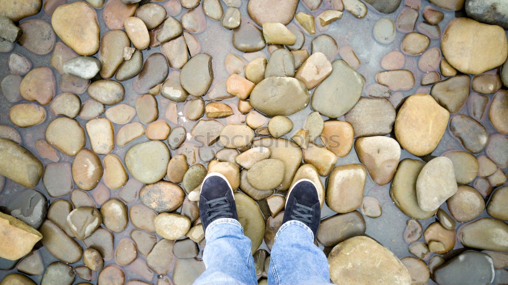 Similar – Rubber Boots Water Splashing