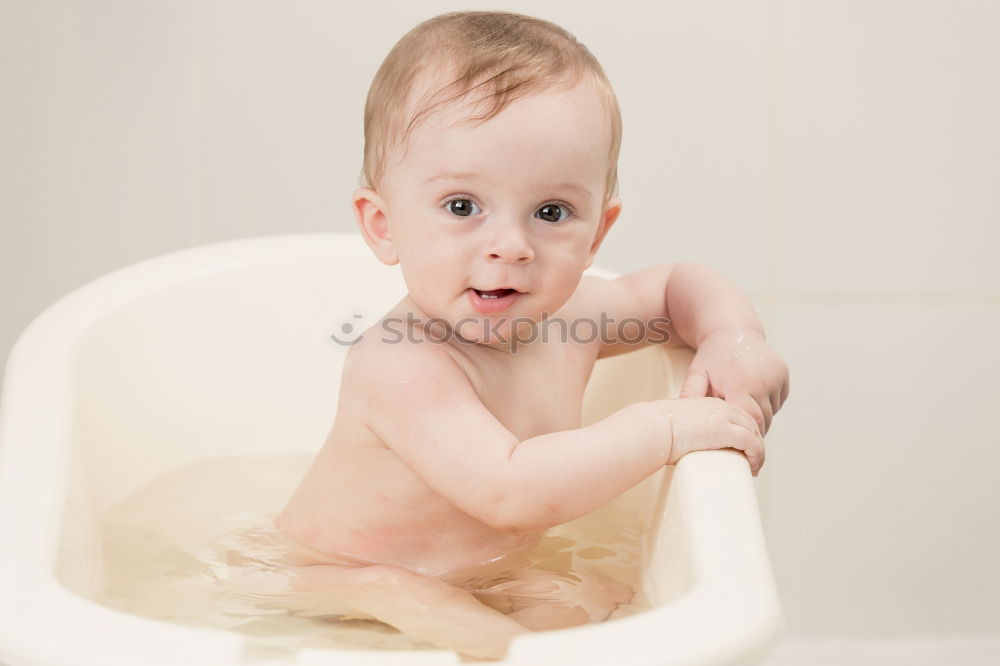 Similar – Image, Stock Photo Little baby taking shower