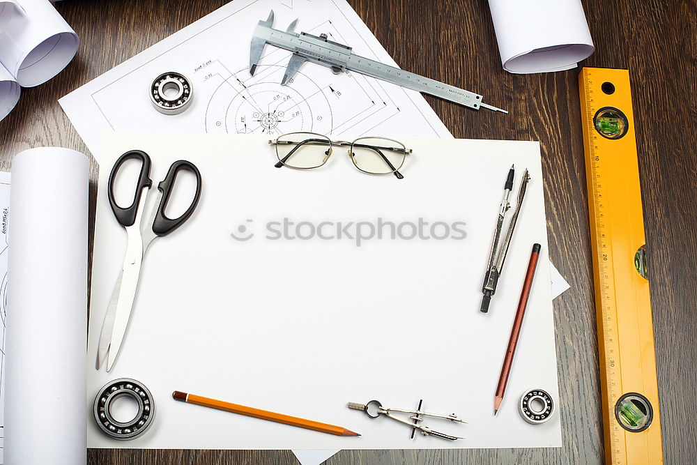 Similar – workplace with notepad, glasses, watch, pen