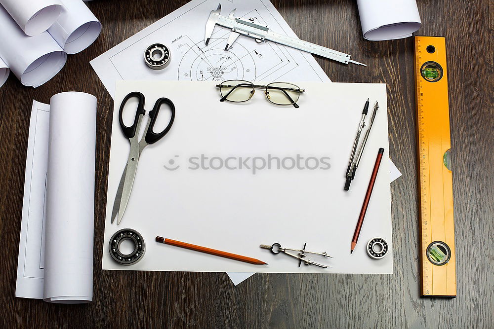 Similar – Red and black desk utensils on a wooden table. notebook, pencils, ruler, tape, sharpener, paper clips, book, stapler